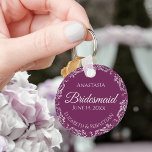 Silver Lace Cassis Purple Bridesmaid Wedding Keychain<br><div class="desc">These beautiful bridesmaid keychains are designed to be given as a gift or wedding favour. The design is simple yet elegant and features a frilly silver grey faux foil border with pale grey text on a cassis purple, magenta or berry coloured background. There is space for her name, the wedding...</div>
