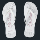 Silver Lace & Dusty Rose Script The Bride Wedding Flip Flops<br><div class="desc">Dance the night away with these beautiful wedding flip flops. Designed for the bride, they feature a simple yet elegant design with dusty rose or mauve pink script lettering on a white background and fancy silver grey lace curls and swirls. Beautiful way to stay fancy and appropriate while giving your...</div>