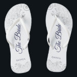 Silver Lace Navy Blue on White The Bride Wedding Flip Flops<br><div class="desc">Dance the night away with these beautiful wedding flip flops. Designed for the bride, they feature a simple yet elegant design with navy blue script lettering on a white background and fancy silver grey lace curls and swirls. Beautiful way to stay fancy and appropriate while giving your feet a break...</div>