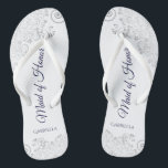 Silver Lace Navy on White Maid of Honour Wedding Flip Flops<br><div class="desc">These beautiful wedding flip flops are a great way to thank and recognize your Maid of Honour while saving her feet at the same time. Features an elegant design with silver grey lace on a white background and fancy navy blue coloured script lettering. The test reads Maid of Honour with...</div>