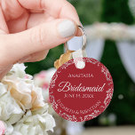 Silver Lace on Romantic Red Bridesmaid Wedding Keychain<br><div class="desc">These beautiful bridesmaid keychains are designed to be given as a gift or wedding favour. The design is simple yet elegant and features a frilly silver grey faux foil border with pale grey text on a romantic crimson red background. There is space for her name, the wedding date and the...</div>