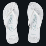 Silver Lace & Teal on White The Bride Wedding Flip Flops<br><div class="desc">Dance the night away with these beautiful wedding flip flops. Designed for the bride, they feature a simple yet elegant design with teal or turquoise coloured script lettering on a white background and fancy silver grey lace curls and swirls. Beautiful way to stay fancy and appropriate while giving your feet...</div>