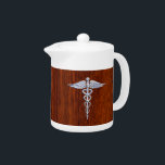 Silver Like Caduceus Medical Symbol Mahogany Print<br><div class="desc">The Symbolic Silver Like Caduceus Medical Symbol design presented here on a mahogany wood grain printed background. The caduceus snakes is designed to look like it is made of chrome. Good for a graduation occasion, a statement for your profession, or for a gift with that medical look your are looking...</div>
