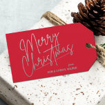 Silver Merry Christmas Red Gift Tags<br><div class="desc">Merry Christmas in a faux silver foil script and your names in chic lettering,  these red gift tags or party favour tags are stylish for any Christmas holiday occasion.</div>