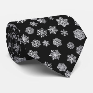 Silver snowflakes on a black background tie
