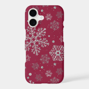Silver snowflakes on dark red