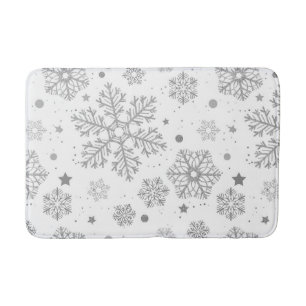 Silver snowflakes on white bath mat