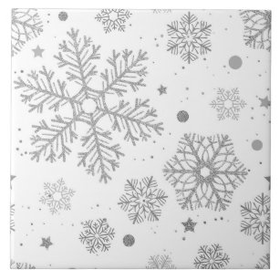 Silver snowflakes on white tile