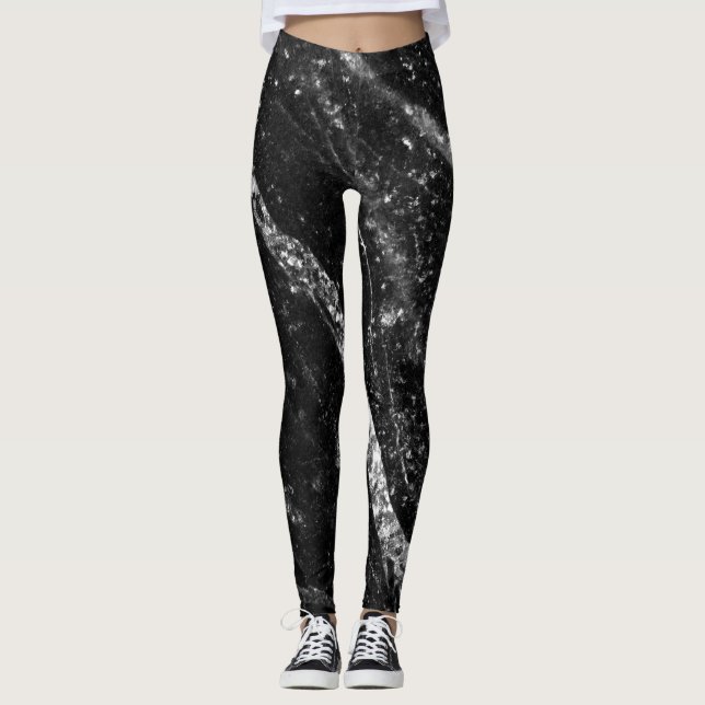 Silver sparkly line on black rock abstract leggings (Front)
