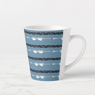 silver spoon and couched thread mug