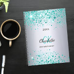 Silver teal glitter name monogram 2025 planner<br><div class="desc">A faux silver looking background decorated with teal,  sea green faux glitter dust. Personalize and add your first name,  monogram initials,  full name and a year.</div>