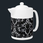 Silver Velvet Teapot<br><div class="desc">A Victorian design looks as though it is done in velvet with a silky silver background. Have your tea,  or put your cream in this and feel like a queen.</div>