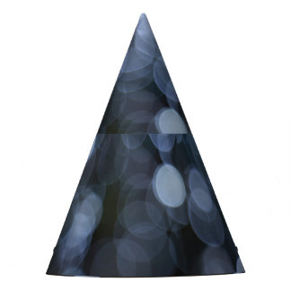 Silver, white bokeh night background. party hat