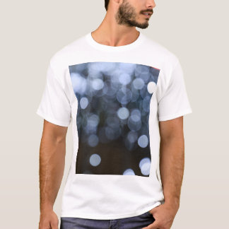 Silver, white bokeh night background. T-Shirt