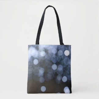 Silver, white bokeh night background. tote bag