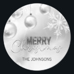 Silver White Christmas Snowflake Snow Baubles Classic Round Sticker<br><div class="desc">Personalize these elegant Christmas stickers in silver and white colours with lights , baubles,  snow,  snowflakes.  Personalize by adding last name,  message or delete.</div>