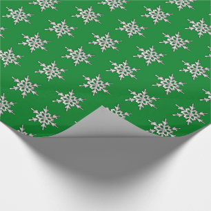 Silver & white snowflake on pine green wrapping paper