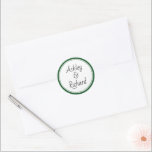 Simple and elegant names dark green wedding classic round sticker<br><div class="desc">Simple and elegant names dark green and white wedding Classic Round Sticker. It displays your names on white with a green border. It coordinates with our "Green tropical leaves" wedding collection.</div>