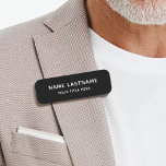 Simple Basic Black Title Safety Pin Magnetic Name Tag<br><div class="desc">Custom Safety Pin or Magnetic Name Lastname and Title Tag, a sophisticated solution tailored for businesses and corporations with a substantial workforce. Crafted with a keen focus on style and simplicity, this name tag boasts an elegant black colour scheme adorned with white letters, embodying a modern aesthetic. Its minimalist design...</div>