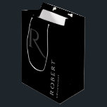 Simple Black Monogram Personalized Groomsmen Mediu Medium Gift Bag<br><div class="desc">This black personalized groomsmen gift bag features personalized groomsman's name,  and calligraphy monogram in grey colour. Change background and fonts colours easily if you like.</div>