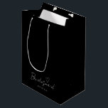 Simple Black Personalized Bridesmaid Gift Bag<br><div class="desc">This black minimalist personalized bridesmaid gift bag features bridesmaid's name and calligraphic text "bridesmaid" with sketched heart element. Great for wedding or bridal shower gifts. You can change background and fonts colours easily if you like.</div>