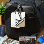 Simple Black White Gold Abstract Luggage Tag<br><div class="desc">Make your luggage stand out with this simple yet elegant black, white, and gold abstract design luggage tag. This luggage tag is made of durable plastic and features a secure buckle strap to attach it to your luggage. The backside has a clear plastic window to display your contact information. This...</div>