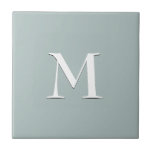 Simple blue grey monogram ceramic tile<br><div class="desc">Simple,  elegant blue grey ceramic tile with optional,  customizable monogram. Designed to coordinate with music notes version. Available in other colours and with matching items.</div>