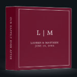 Simple Burgundy Monogram Elegant Wedding Binder<br><div class="desc">Simple wedding binder featuring a modern yet elegant design with your two letter monogram along with your names and wedding date surrounded by a thin border. All text is in white over a burgundy background. The fonts and background colours may be changed to any colours you wish. A chic and...</div>
