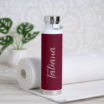 Simple Burgundy Name Elegant Script Modern Water Bottle<br><div class="desc">Modern burgundy water bottle featuring a simple and minimalist design with your name in an elegant script.  A cute design perfect for a girly girl.</div>