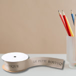 Simple Business Name On Tan Satin Ribbon<br><div class="desc">Add the finish touches to your packing and parcels. This simple design has your business name. It is part of a collection of matching items, ideal for clothing boutiques and the fashion businesses both online and in-store. For best results, use all capital letters when adding your company's name. Both the...</div>