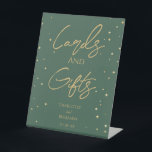 Simple Classic Christmas Wedding Cards and Gifts Pedestal Sign<br><div class="desc">This simple classic Christmas wedding cards and gifts pedestal sign features a clean, bright white backdrop with simple, minimalist black and gold lettering and handwritten calligraphy accents. Embellishments of beautiful and classic green and red Christmas wreaths with delicate gold features create a perfect winter holiday aesthetic while maintaining a polished...</div>