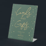 Simple Classic Christmas Wedding Cards and Gifts Pedestal Sign<br><div class="desc">This simple classic Christmas wedding cards and gifts pedestal sign features a clean, bright white backdrop with simple, minimalist black and gold lettering and handwritten calligraphy accents. Embellishments of beautiful and classic green and red Christmas wreaths with delicate gold features create a perfect winter holiday aesthetic while maintaining a polished...</div>