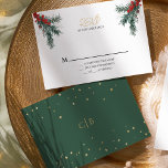 Simple Classic Christmas Wedding RSVP Card<br><div class="desc">This simple classic Christmas wedding rsvp card features a clean, bright white backdrop with simple, minimalist black and gold lettering and handwritten calligraphy accents. Embellishments of beautiful and classic green and red Christmas wreaths with delicate gold features create a perfect winter holiday aesthetic while maintaining a polished elegance for your...</div>