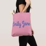 Simple Cute Blue and Pink Personalized Tote Bag<br><div class="desc">A cute modern simple design of your name in a fun typography style in cobalt blue on a millennial pink background.</div>