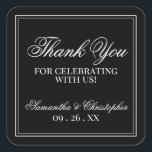 Simple Elegance Black Wedding Thank You Square Sticker<br><div class="desc">These wedding thank you stickers are simple,  classic,  timeless and beautiful The design features a black background with a white border and elegant white script lettering reading: Thank You for celebrating with us. There is space for the couple's names and the wedding date.</div>