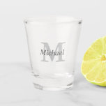 Simple Elegant Monogram and Name Shot Glass<br><div class="desc">This design has a large monogram initial in light grey with the name in darker charcoal grey placed across the initial. Personalize this design for someone special by replacing the sample text shown in the design template. This item makes a nice groomsman gift, Father's Day or birthday gift, housewarming gift...</div>