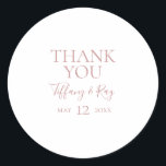 Simple Elegant Rose Gold Thank You Wedding Favour Classic Round Sticker<br><div class="desc">This simple elegant rose gold thank you wedding favour classic round sticker is perfect for your classic modern minimalist rose gold wedding. Design features classic vintage minimal chic contemporary blush gold font and delicate romantic formal calligraphy. It's excellent for spring, summer, fall, or winter luxury weddings. Keep it as is,...</div>