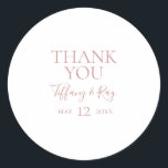 Simple Elegant Rose Gold Thank You Wedding Favour Classic Round Sticker<br><div class="desc">This simple elegant rose gold thank you wedding favour classic round sticker is perfect for your classic modern minimalist rose gold wedding. Design features classic vintage minimal chic contemporary blush gold font and delicate romantic formal calligraphy. It's excellent for spring, summer, fall, or winter luxury weddings. Keep it as is,...</div>