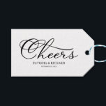 Simple Elegant Script Cheers Wine Bottle Tags<br><div class="desc">Transform your wedding day into a celebration of sophistication and elegance with our stunning black and white modern wedding suite! You can personalize it with just a few clicks to express your unique love story. This inspiring collection includes everything you need to create a beautifully cohesive atmosphere, featuring matching menu...</div>