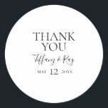 Simple Elegant Thank You Wedding Favour Sticker<br><div class="desc">This simple elegant thank you wedding favour sticker is perfect for your modern minimalist black and white wedding. The design features minimal contemporary font accompanied by formal calligraphy. Keep it as is,  or choose to personalize it with your own artwork or photos!</div>
