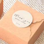 Simple Elegant Thank You Wedding Off White Classic Round Sticker<br><div class="desc">Introducing the Simple, Elegant Thank You Wedding Classic Round Sticker! This sticker is not just a product, it's a timeless expression of gratitude. The exquisite blend of understated chic and classic elements not only elevates the visual appeal but also imparts a personal touch to your wedding favours. So, seal your...</div>