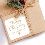 Simple Gold Merry Christmas Calligraphy Script Square Sticker<br><div class="desc">An elegant gold Merry Christmas Sticker with pretty script typography. Personalize it with your name. Designed for you by Blackberry Boulevard.</div>