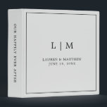 Simple Light Grey Monogram Elegant Wedding Binder<br><div class="desc">Simple wedding binder featuring a modern yet elegant design with your two letter monogram along with your names and wedding date surrounded by a thin border. All text is in black over a light grey / silver background. The fonts and background colours may be changed to any colours you wish....</div>
