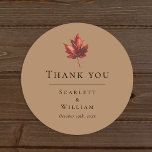 Simple Minimal Fall Terracotta Wedding Thank You Classic Round Sticker<br><div class="desc">This simple minimal fall terracotta wedding thank you classic round sticker is inspired by the delicate elegance of nature's transition, with a rustic and simple charm that captures the essence of fall. This design features a minimalist boho maple leaf, on a terracotta background. Each piece in this collection invites you...</div>