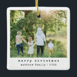 Simple Minimalist Typewriter Family Photo Ceramic Ornament<br><div class="desc">This simple and modern family Christmas ornament features a place for you to add your names and a main photo, alongside ‘Merry Christmas’ in beautiful typewriter typography, and room for you to add your own photo montage on the back (with space for seven photos). The perfect minimalist xmas holiday gift...</div>