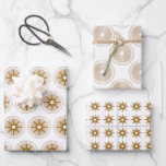 Simple Modern Gold Starburst Christmas Wrapping Paper Sheet<br><div class="desc">Simple modern gold starburst christmas wrapping paper sheets. Simple modern gold star designs with complimentary design elements in a traditional gold and white holiday colour palette.</div>