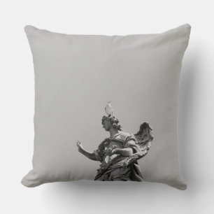 Simple, modern photo of seagull on top of statue throw pillow