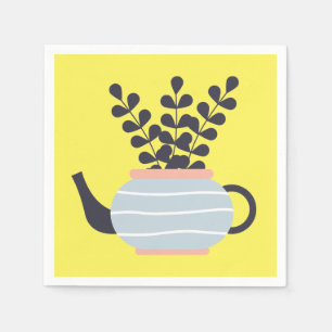 Simple modern teapot with plant pastel napkin