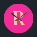 Simple Monogram Modern Hot Pink Round Clock<br><div class="desc">This is a simple, modern, personalized monogram design. This stylish design is in trending hot pink with stylish typography. It's perfect for a personalized gift or ideal as a new home decor accessory for yourself. Simply add your initial letter by typing it into the personalize this text box. Check out...</div>