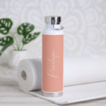 Simple Name Elegant Peach Modern Water Bottle<br><div class="desc">Modern water bottle featuring a simple and minimalist design with your name in an elegant script over a peach background.   A cute design perfect for a girly girl.</div>